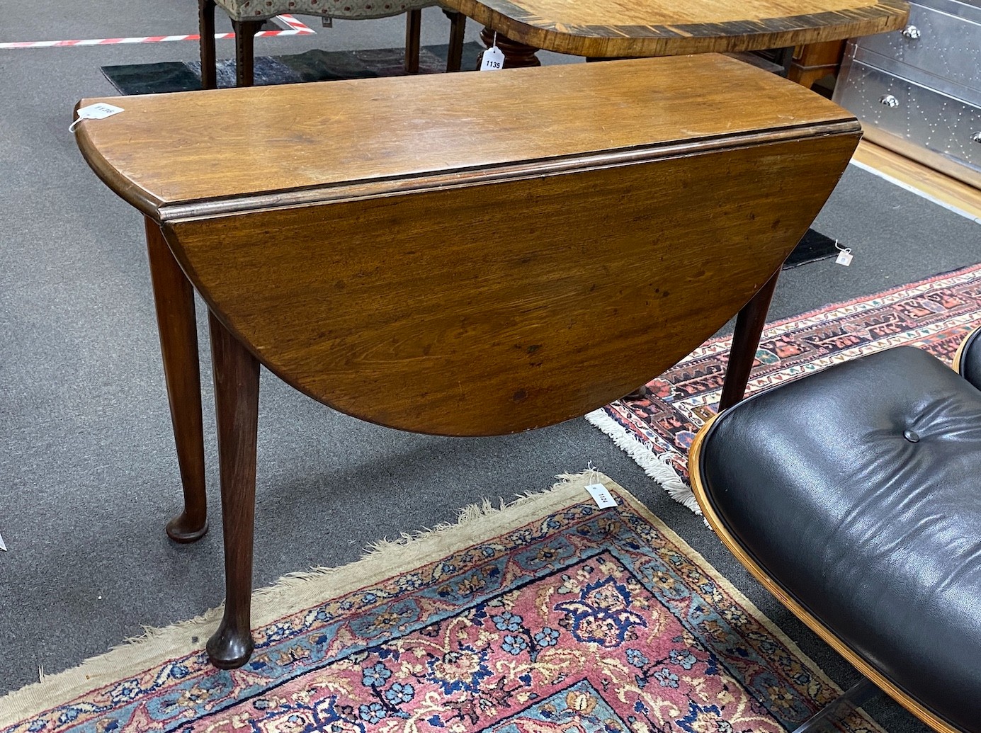 A George III mahogany dropleaf table with pad feet, width 114cm